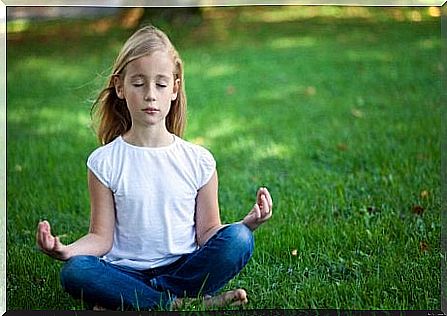 Girl learns meditation.