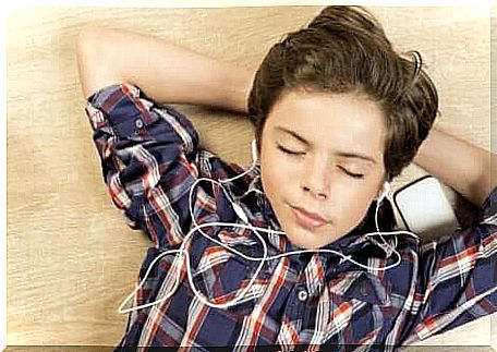 Boy listens to music