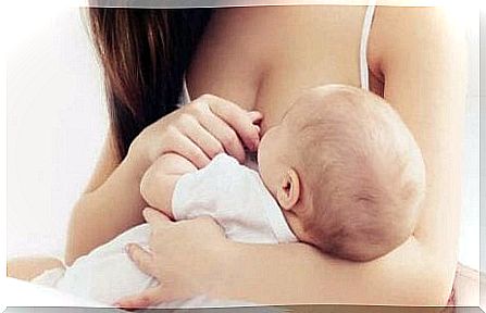 Mother breastfeeds Babz