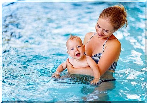 Mother-child swimming