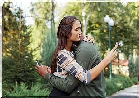 Couple using cell phone