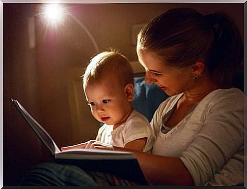 Baby and mother read